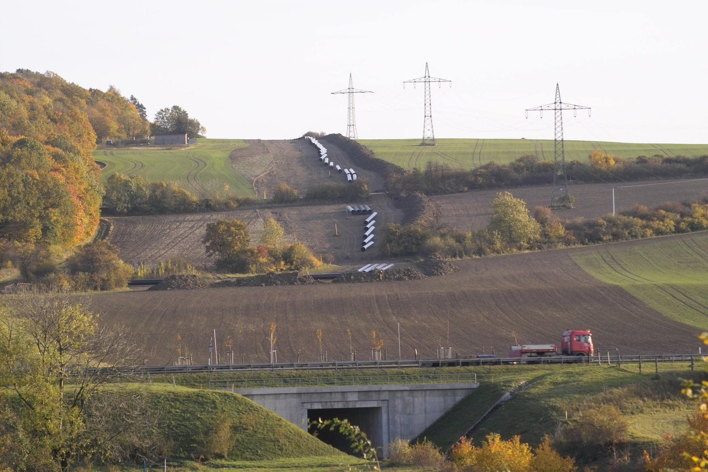 Large-diameter pipe strung along a construction right-of-way