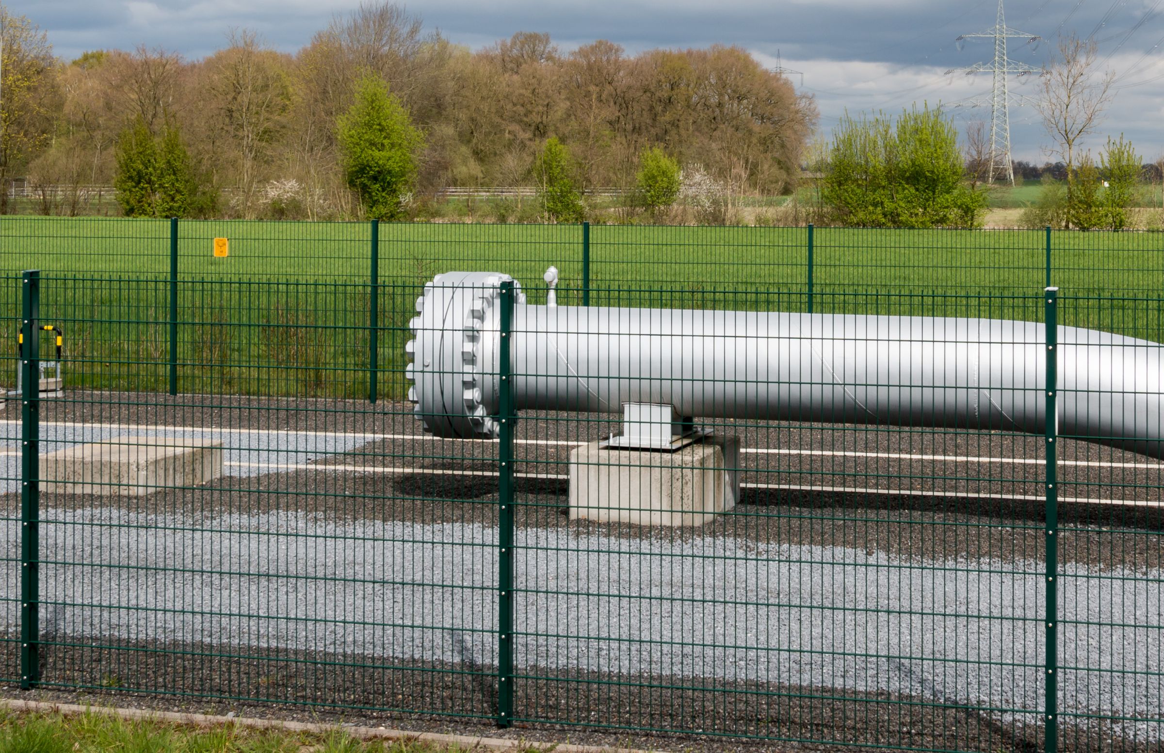 A pig launcher on a buried pipeline