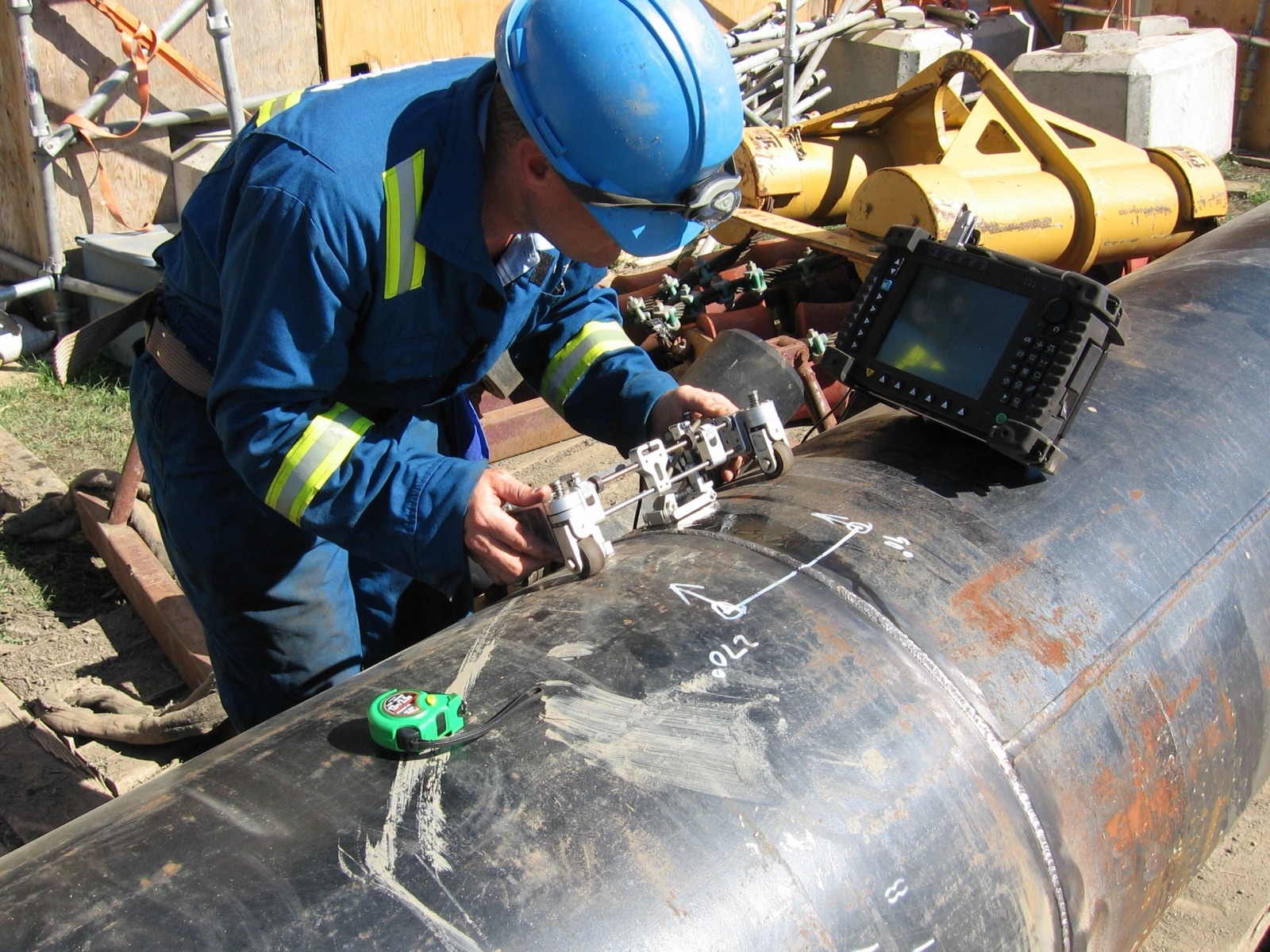 Ultrasonic inspection on exposed, marked pipeline